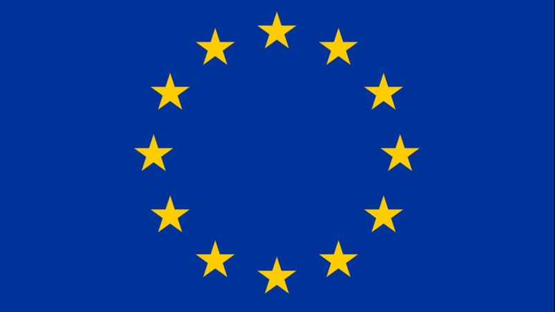 EU:s symbol, 12 gula stjärnori cirkel mot blå bakgrund.