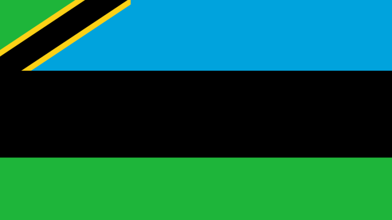 Tanzanias flagga är blå och grön med ett diagonalt svart fält, där det svarta fältet omges av skiljeränder i gult. 